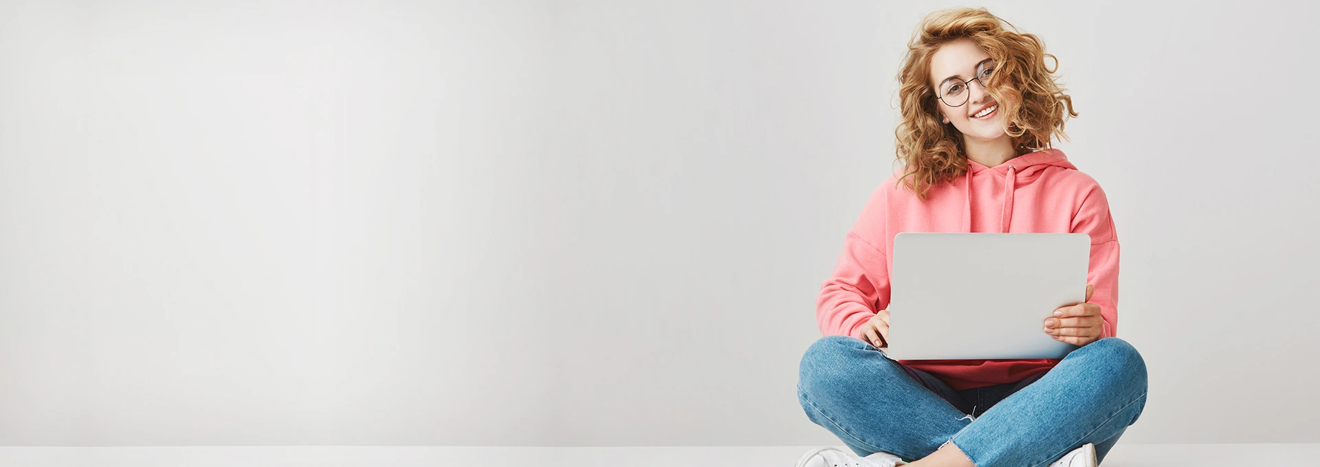 A female student submitting a research paper on IJAIT: An UGC Compliant Peer reviewed Journal.